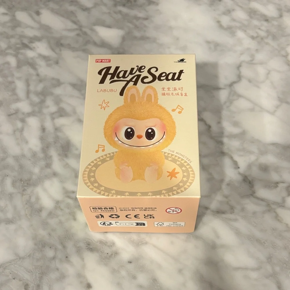 Labubu 'Have A Seat' Collectible Figure “HeHe”